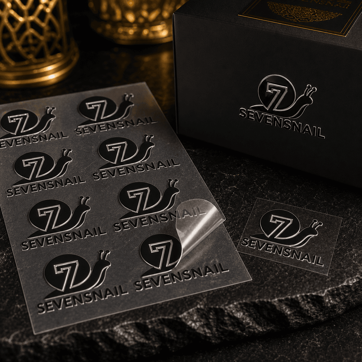 Sevensnail raised UV transfer sticker sheet beside a black gift box